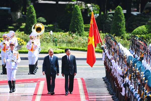 Lễ đón Tổng Bí thư, Chủ tịch nước Lào thăm hữu nghị chính thức Việt Nam