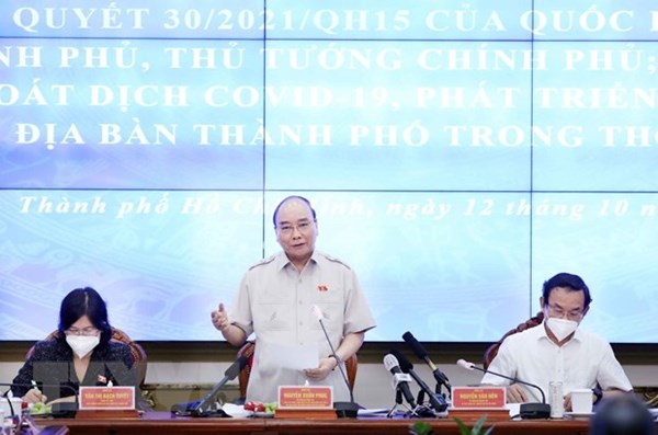 Chủ tịch nước Nguyễn Xuân Phúc: Kiểm soát tốt dịch bệnh là điều kiện tiên quyết phục hồi kinh tế