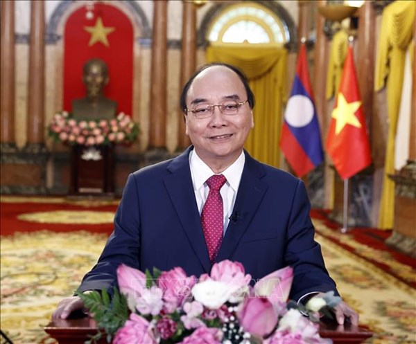 Chủ tịch Nước Nguyễn Xuân Phúc: Mối quan hệ Việt Nam - Lào sẽ tiếp tục nở hoa thơm, kết trái ngọt