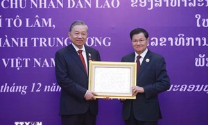 Lễ trao tặng Huân chương Vàng Quốc gia của Lào cho Tổng Bí thư Tô Lâm 